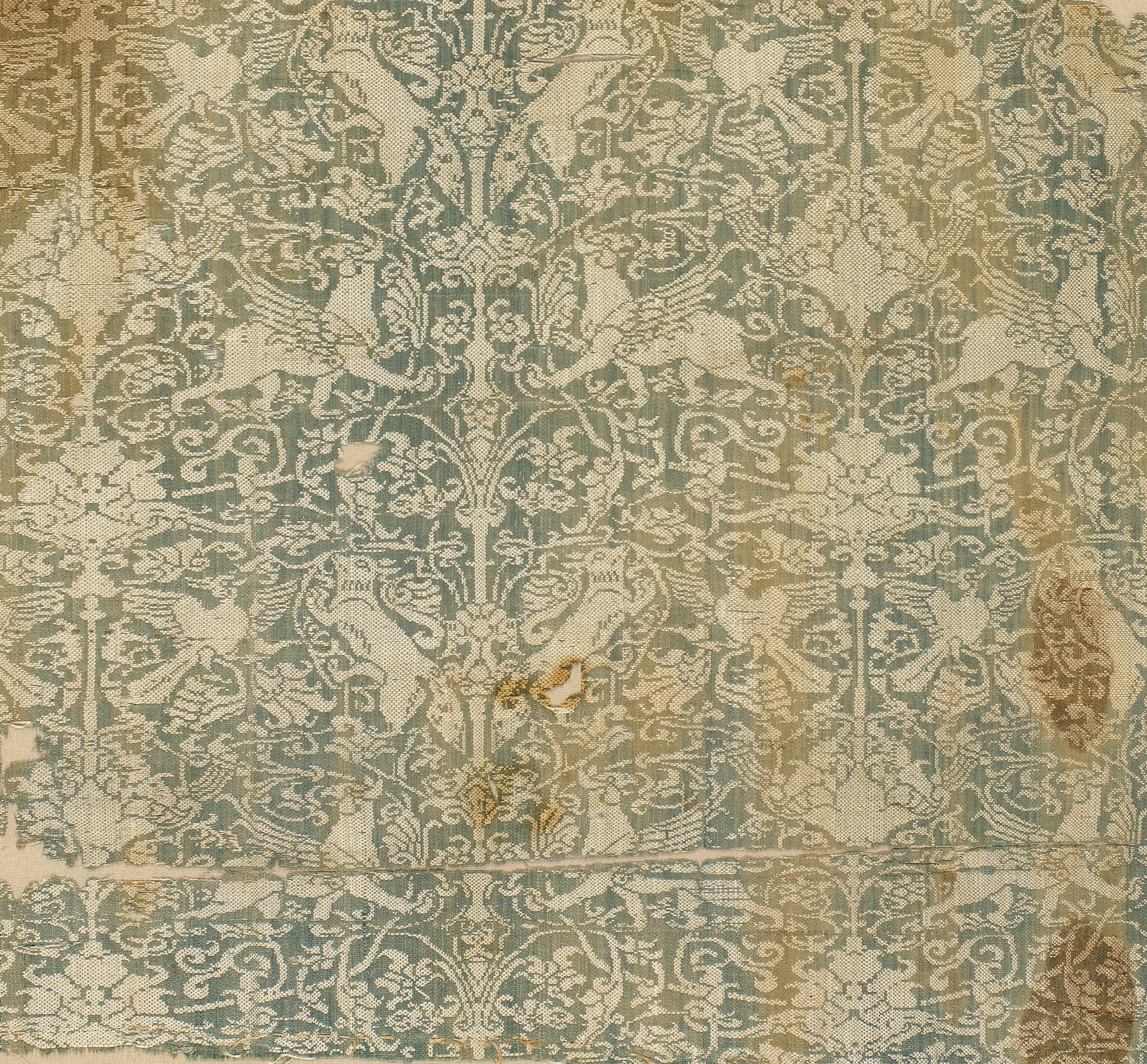 Silk textile with birds, griffins, and foxes