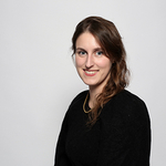 woman in a sport coat at 3/4 view