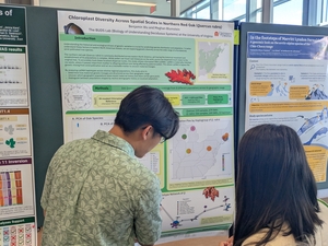 Ben presenting his poster