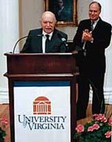 As President Casteen looks on, John W. Kluge speaks at the Rotunda on May 25, the day his gift is announced.