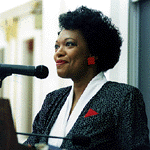 Poet Laureate Rita Dove, whose book, Lady Freedom Among Us, was selected as the four millionth volume acquired by the University Library last fall.