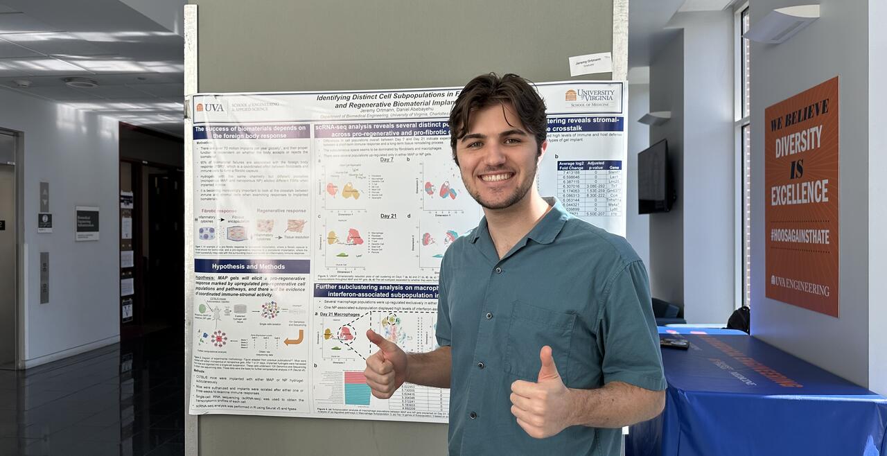 jeremy presenting a poster