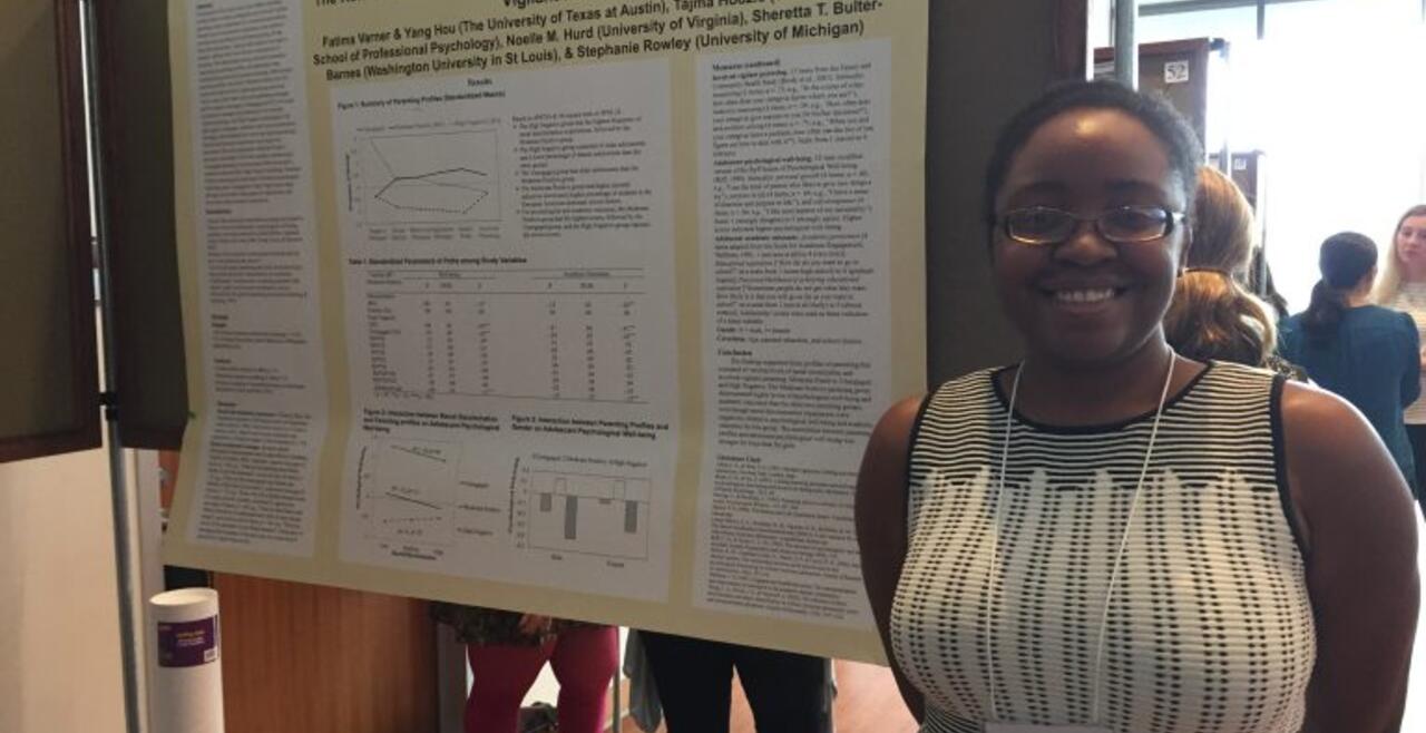A photo of faculty collaborator Fatima Varner presenting PHAD Lab research at the 16th Biennial Conference of the Society for Community Research and Action in Ottawa, Canada