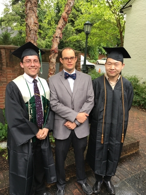 Rob Mina and Yongyi Wu at graduation